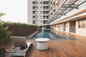 Warm and Cozy Stay 2BR Belmont Residence Puri Apartment By Travelio